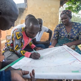 A Global Effort to Unleash Local Data: How Open Mapping is Shaping Grassroots Climate Resilience Worldwide